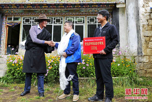 烟台好人邹风谦到西藏牧村结对认亲